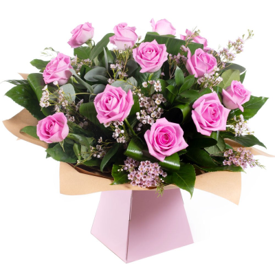 Dreamy Dozen - A hand-tied bouquet delivered in water of 12 high quality pink roses and complementary filler wrapped in paper/ cellophane in a box / bag.