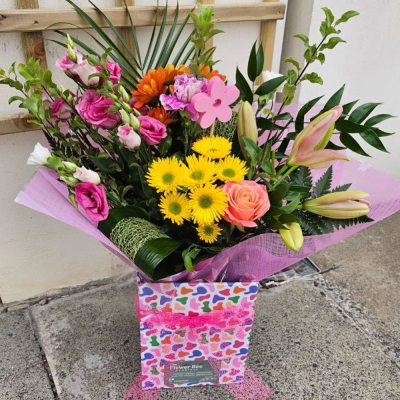 Mamma Mia - Make their day with this bright and vibrant collection of flowers, beautifully presented in a gift box / bag.